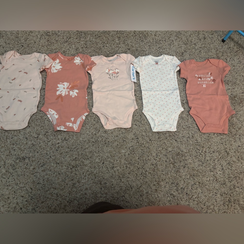 Carters
5 pack girls onesies 
Opened out of package to show. Tags on 
6 months